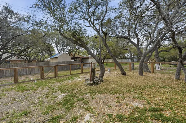 a house with trees in front of it