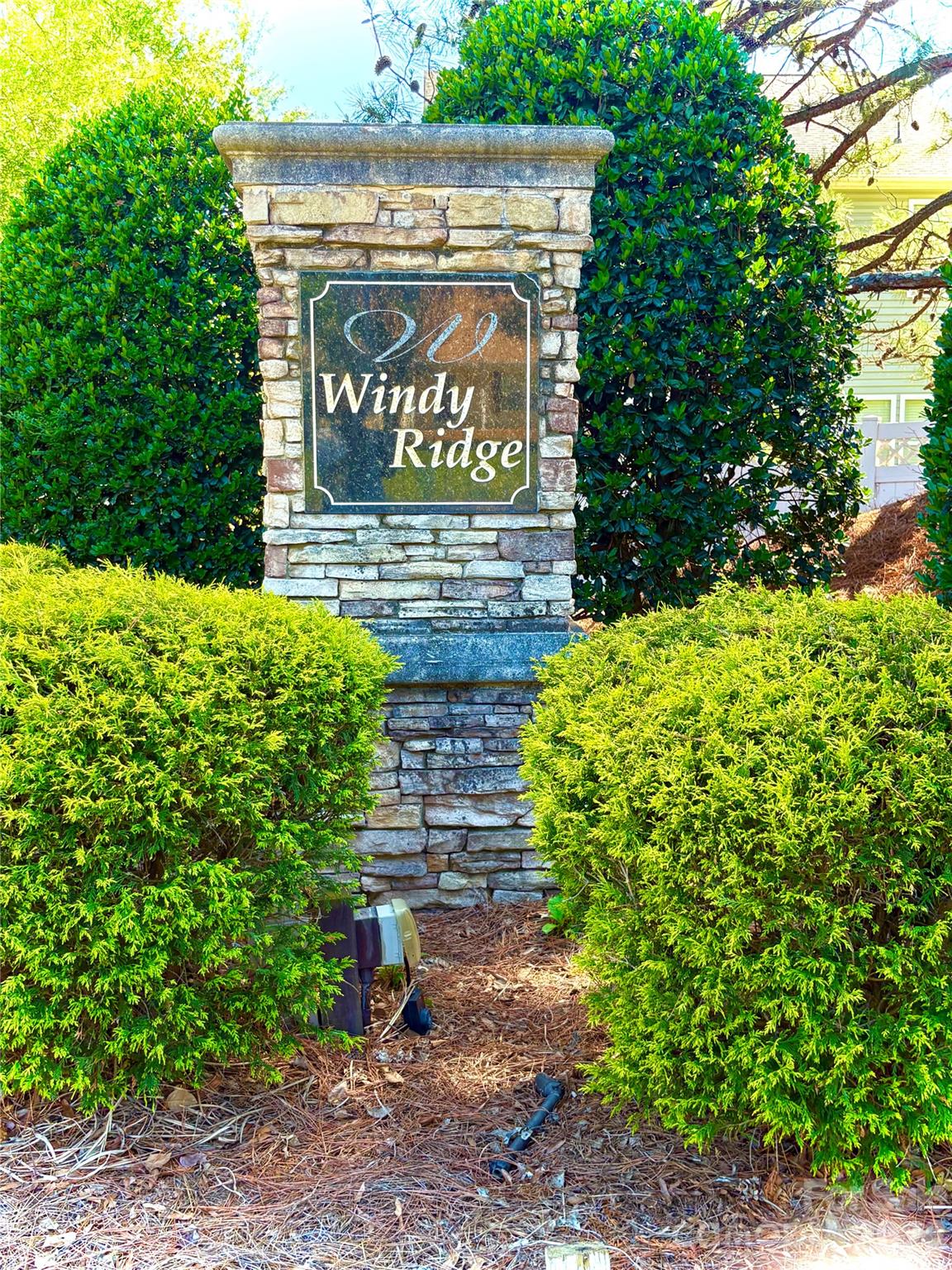 2514 Spring Breeze Way Monroe, NC 28110 - Photo 2 of 25 a sign that is on a brick wall