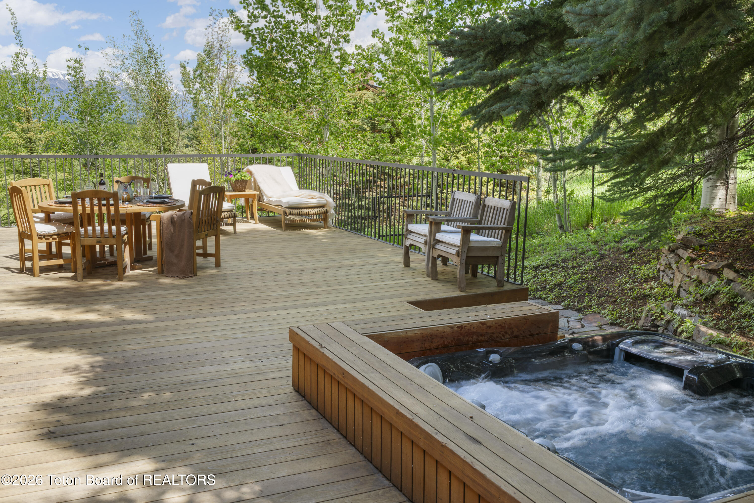 5070 Beavertail Road Wilson, WY 83014 - Photo 32 of 34 Hot tub and deck