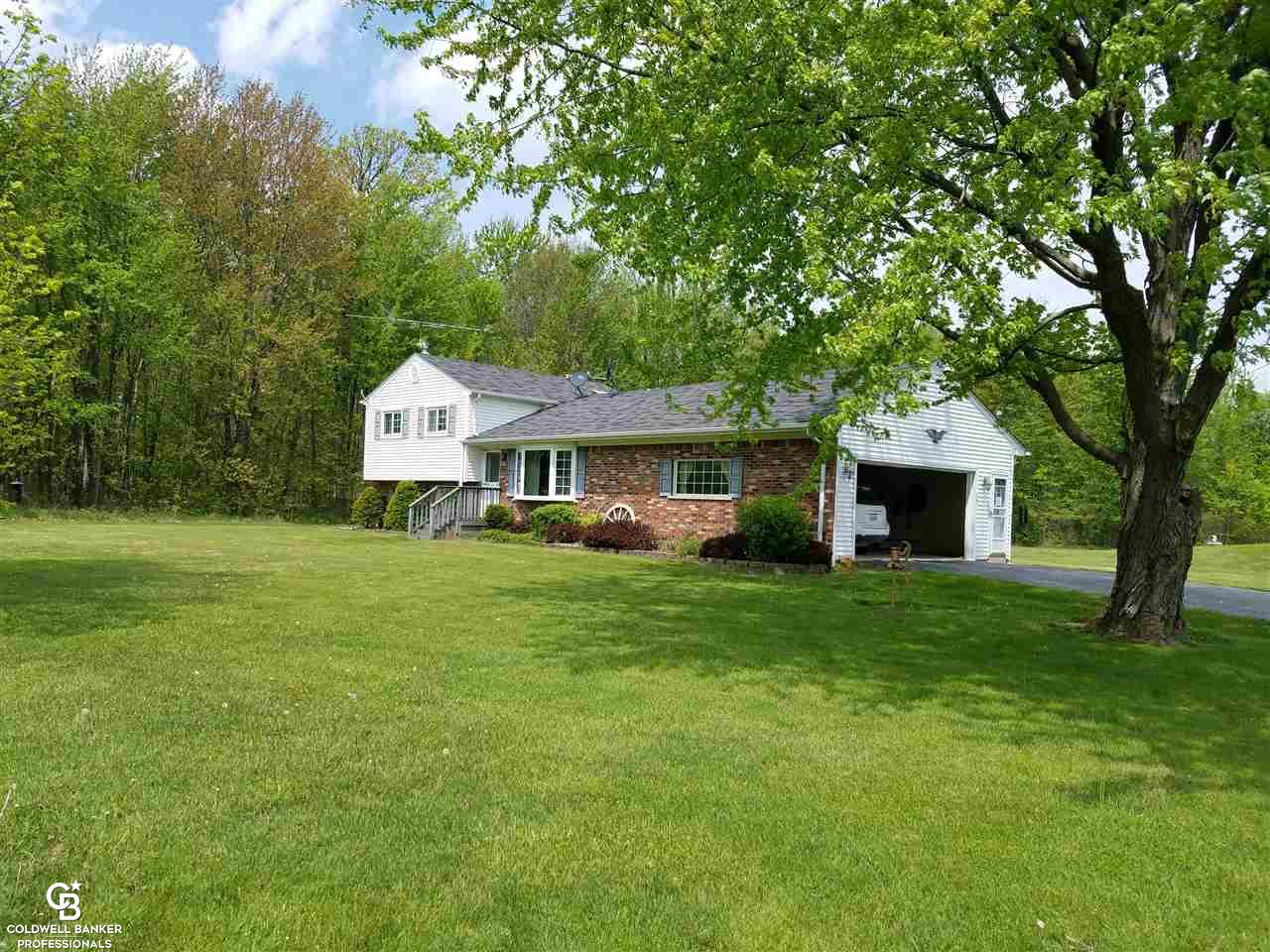 9100 Brandon Road Avoca, MI 48006 - Photo 1 of 21 This is a view of the front of the home.