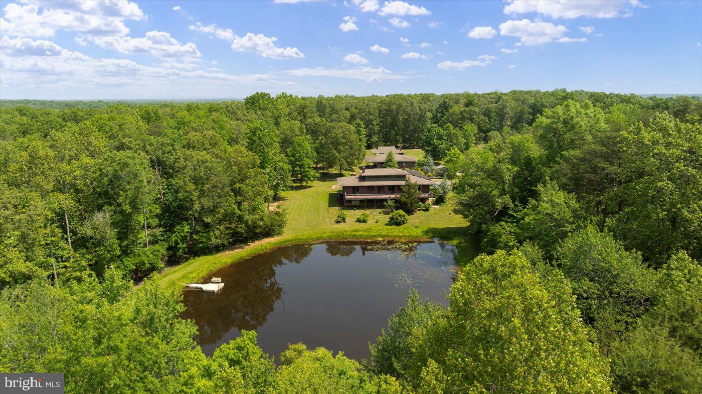 29227 General Rhodes Lane Rhoadesville, VA 22542 - Photo 112 of 129 a view of a yard with a swimming pool and outdoor seating