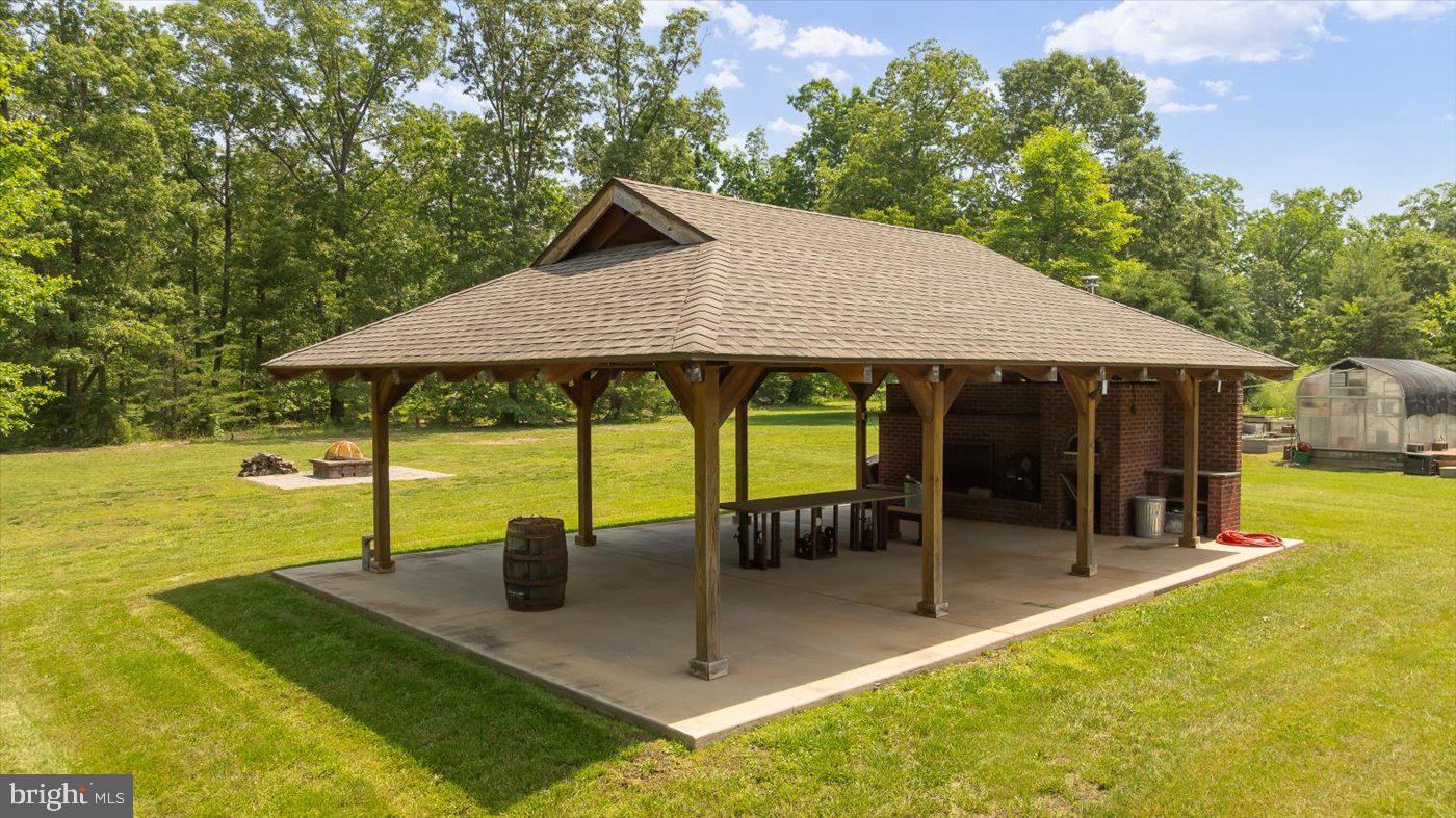 29227 General Rhodes Lane Rhoadesville, VA 22542 - Photo 122 of 129 a view of house with swimming pool outdoor seating