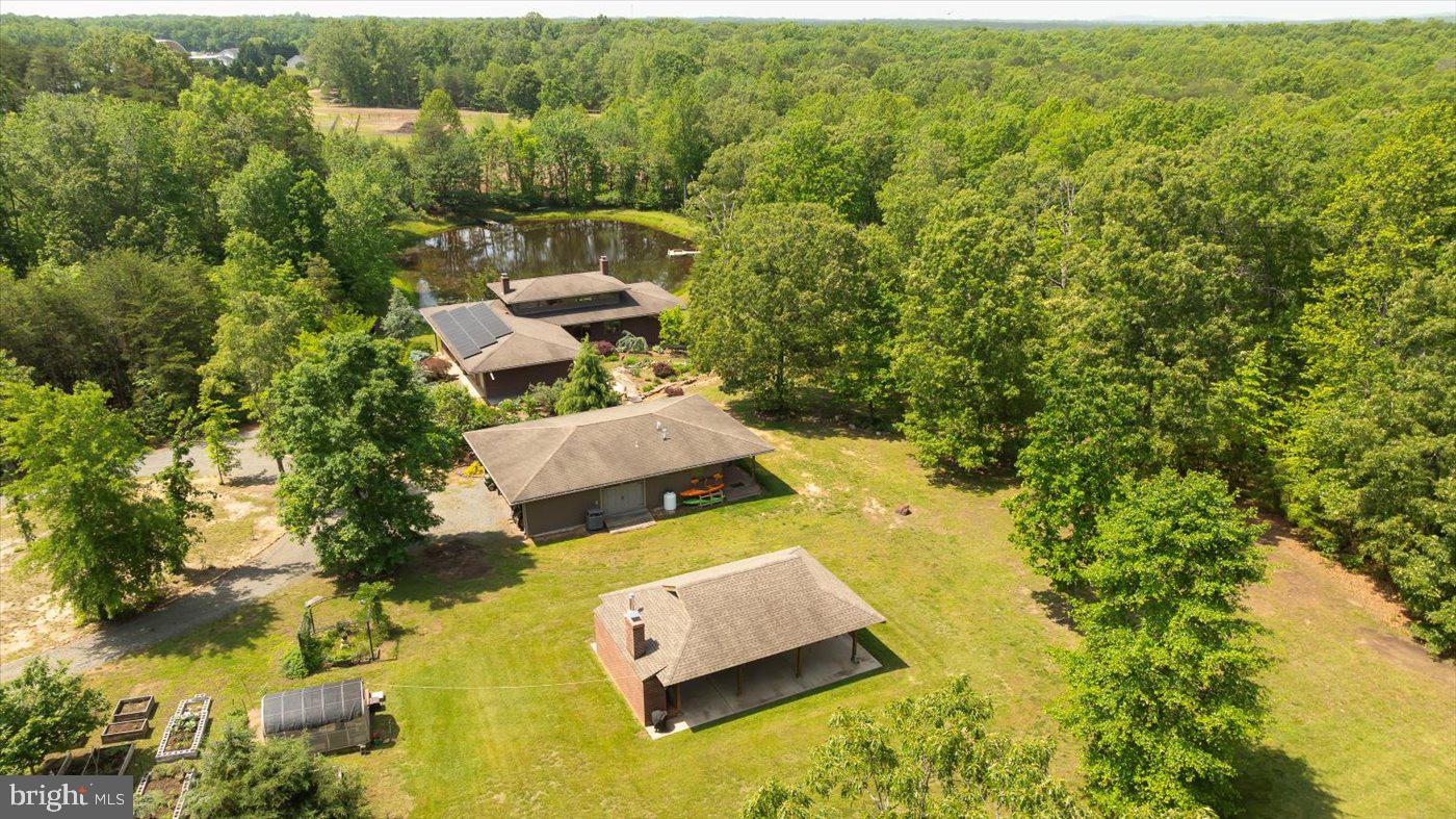 29227 General Rhodes Lane Rhoadesville, VA 22542 - Photo 124 of 129 an aerial view of a house with a yard
