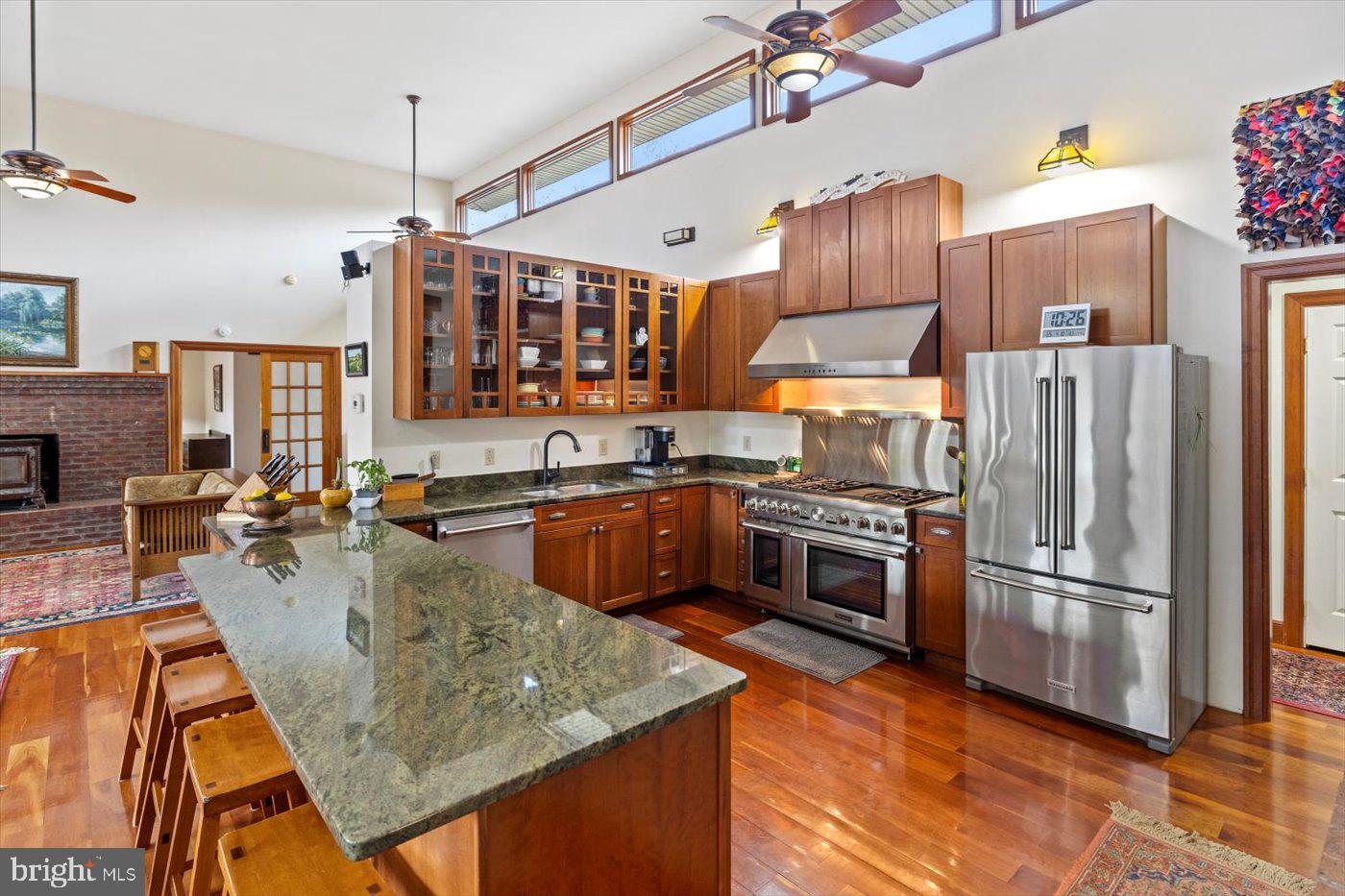 29227 General Rhodes Lane Rhoadesville, VA 22542 - Photo 3 of 129 a kitchen with stainless steel appliances granite countertop a refrigerator a stove and a sink