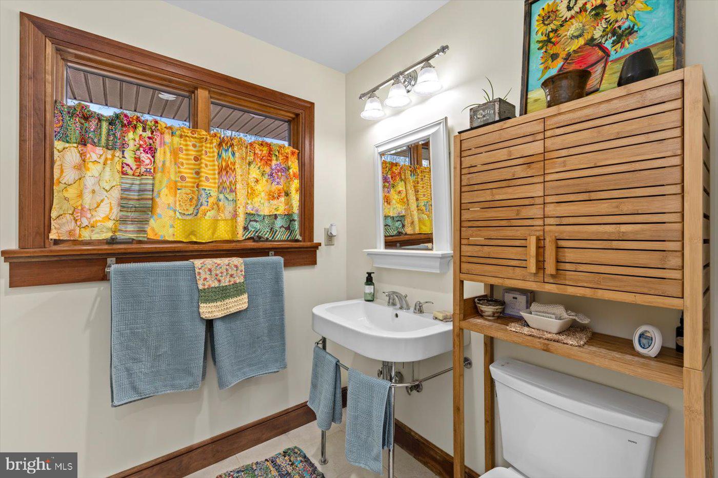 29227 General Rhodes Lane Rhoadesville, VA 22542 - Photo 34 of 129 a bathroom with a sink and a window