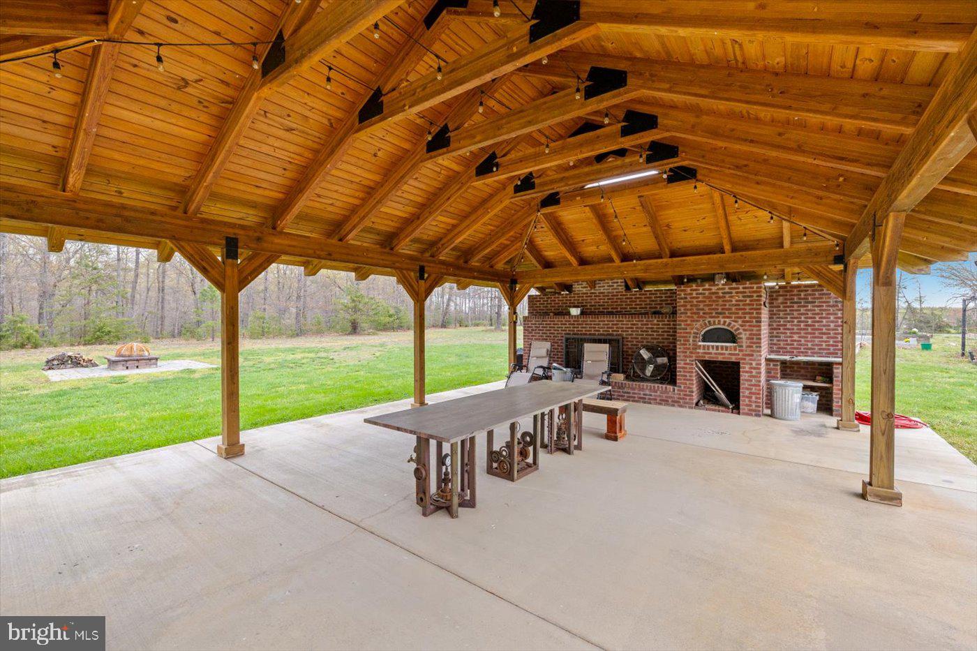 29227 General Rhodes Lane Rhoadesville, VA 22542 - Photo 55 of 129 Pavilion with brick oven & fireplace