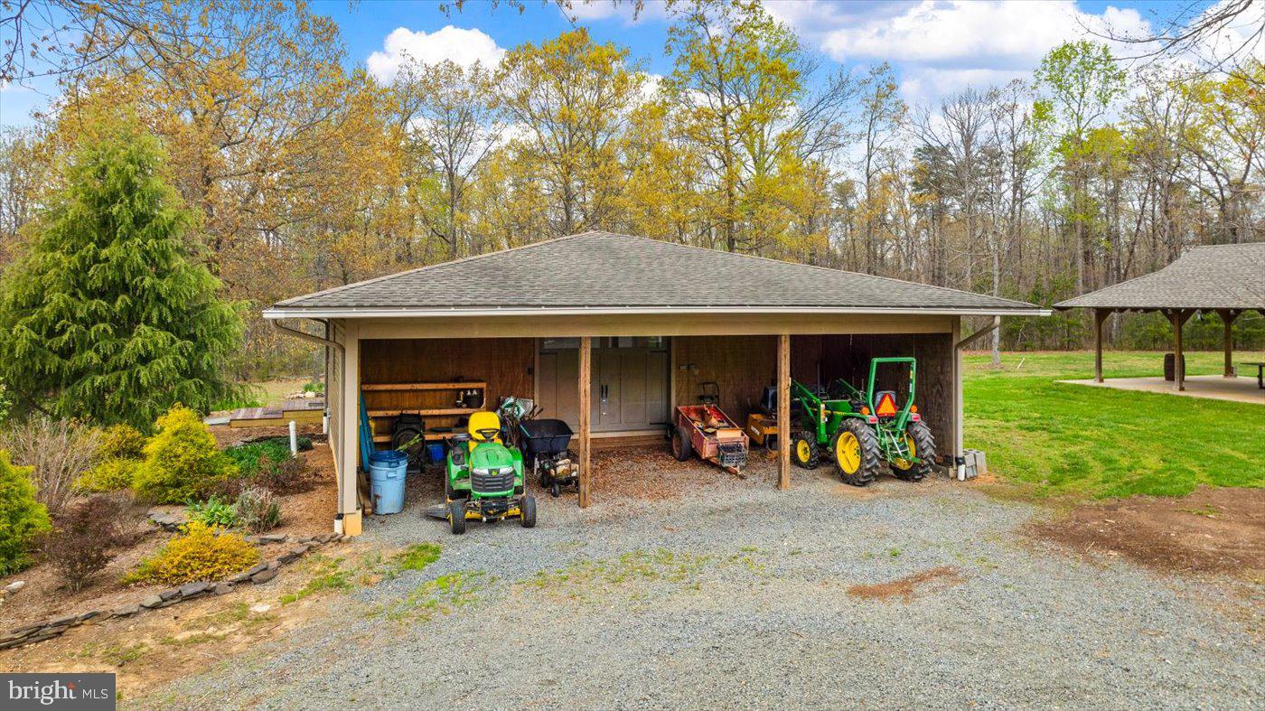 29227 General Rhodes Lane Rhoadesville, VA 22542 - Photo 71 of 129 Workshop with lean-to