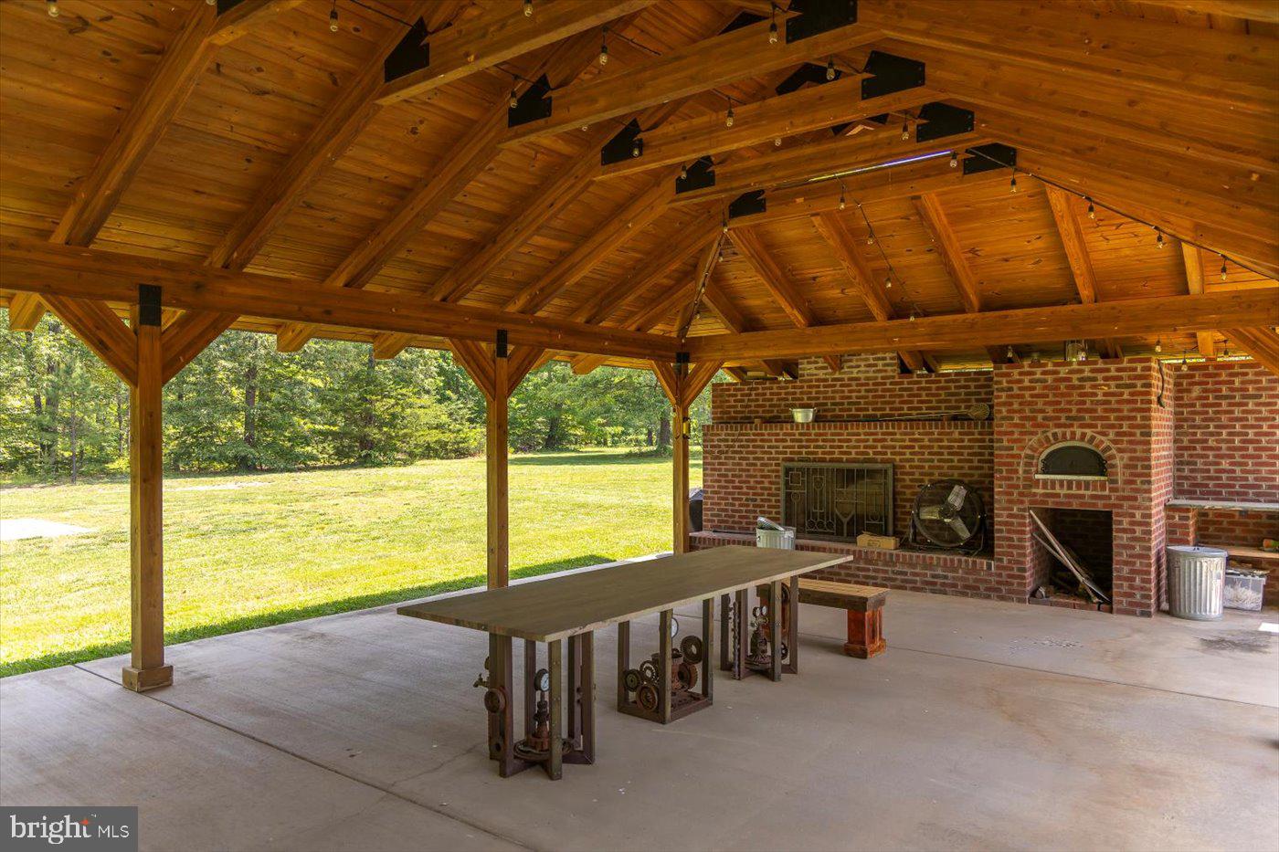 29227 General Rhodes Lane Rhoadesville, VA 22542 - Photo 98 of 129 a view of a swimming pool with a outdoor seating