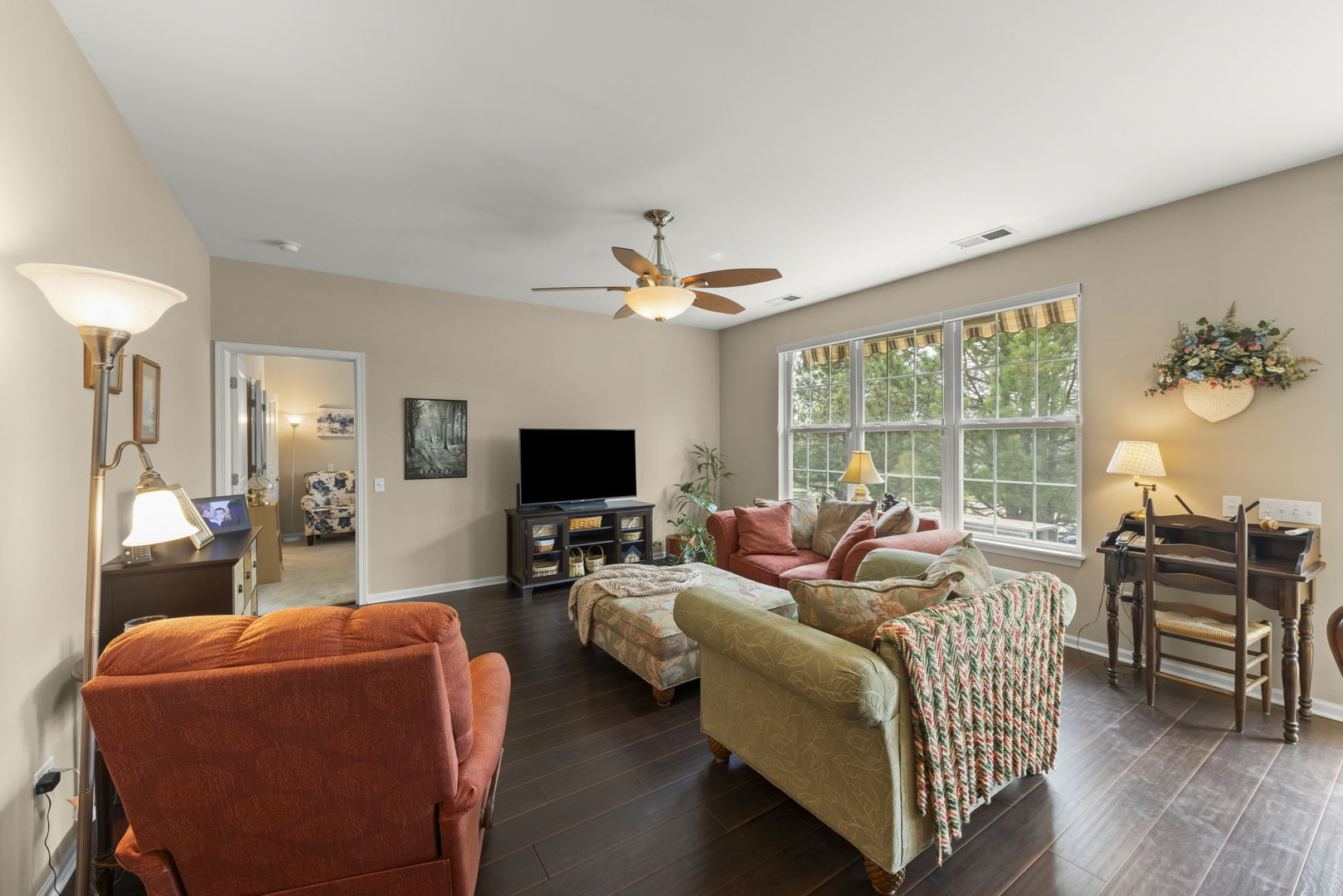 14013 Francesca Cove Huntley, IL 60142 - Photo 13 of 60 a living room with furniture and a flat screen tv