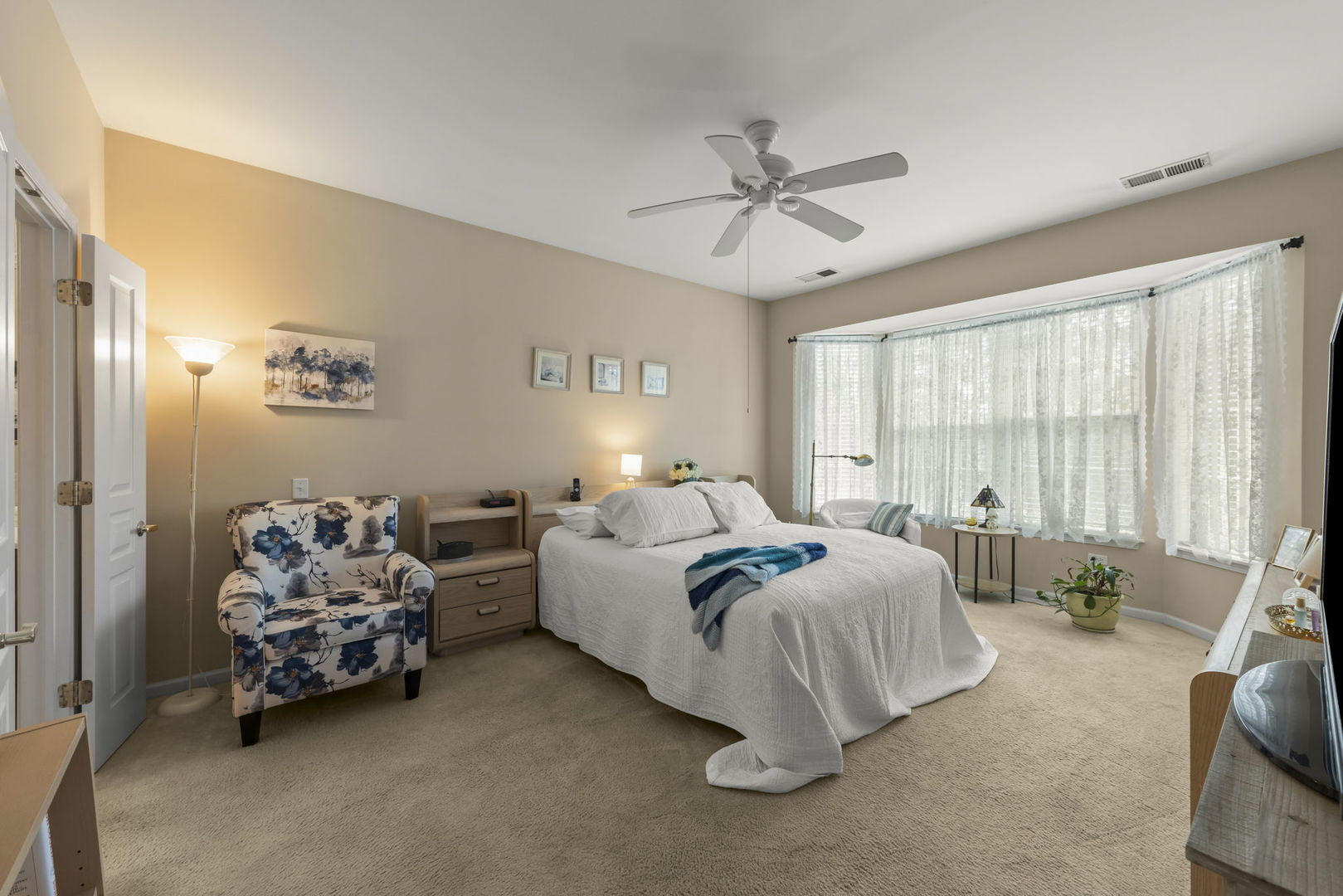 14013 Francesca Cove Huntley, IL 60142 - Photo 15 of 60 a spacious bedroom with two beds and a chandelier
