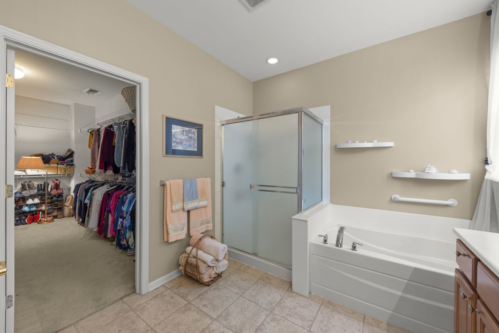 14013 Francesca Cove Huntley, IL 60142 - Photo 18 of 60 a bathroom with a tub and a shower