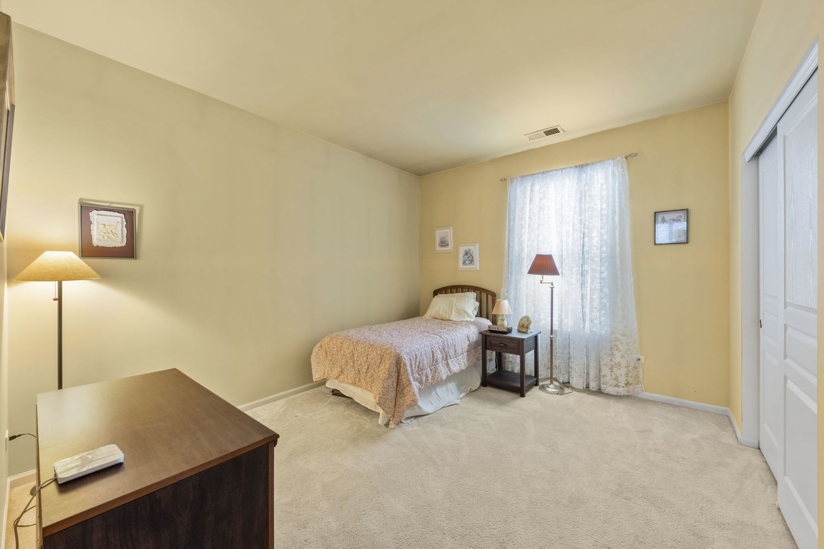 14013 Francesca Cove Huntley, IL 60142 - Photo 20 of 60 a bedroom with a bed and a table