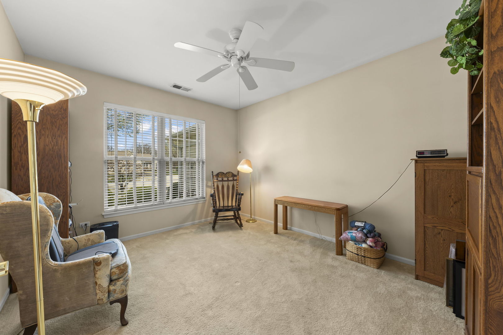 14013 Francesca Cove Huntley, IL 60142 - Photo 24 of 60 a view of a livingroom with furniture and a ceiling fan