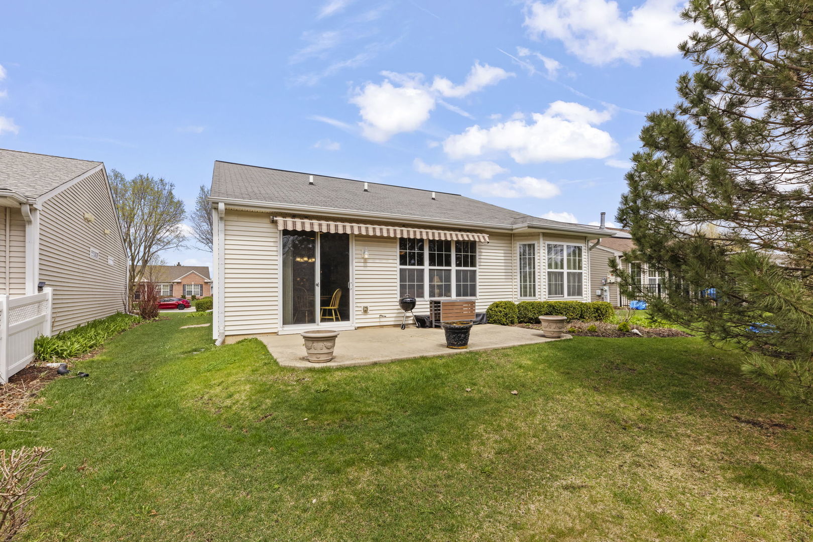 14013 Francesca Cove Huntley, IL 60142 - Photo 29 of 60 a view of a house with backyard sitting area and garden
