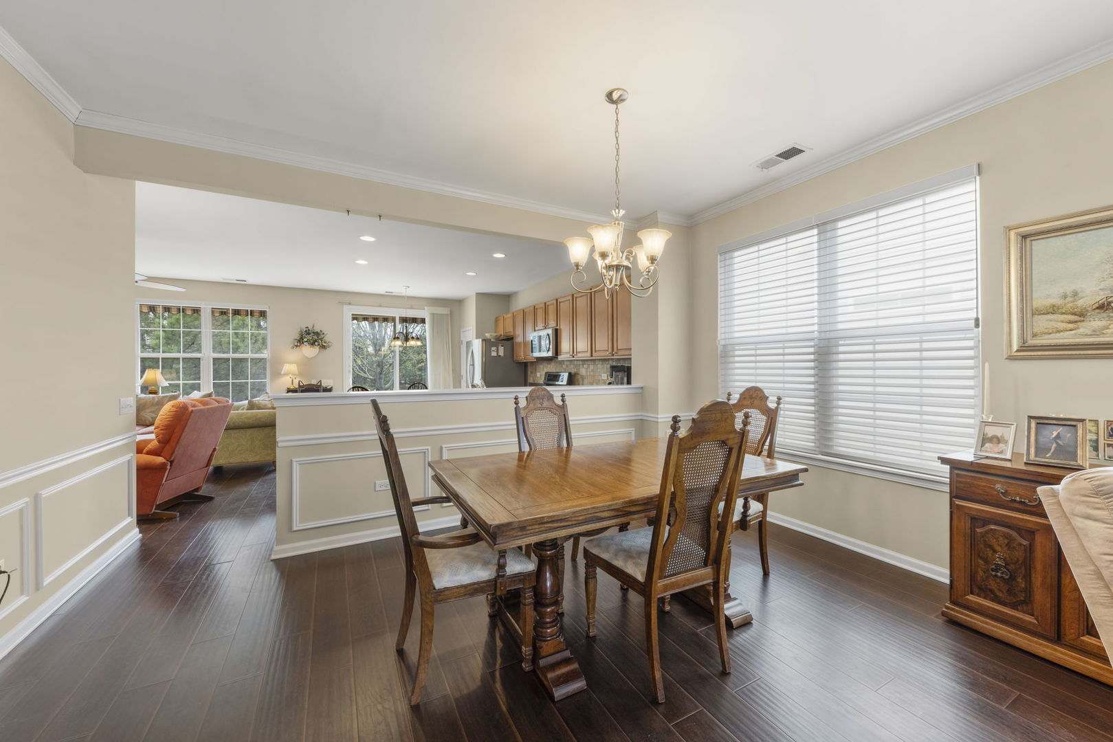 14013 Francesca Cove Huntley, IL 60142 - Photo 7 of 60 a view of a dining room with furniture window and wooden floor