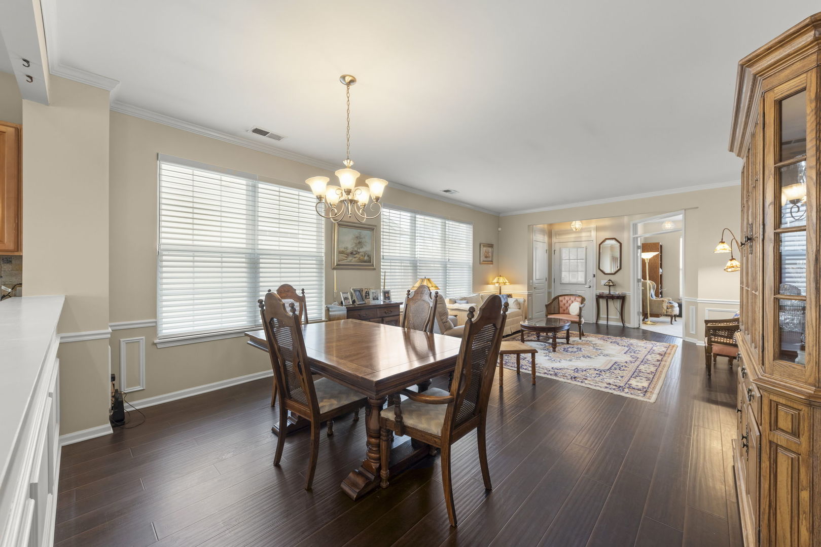 14013 Francesca Cove Huntley, IL 60142 - Photo 8 of 60 a view of a dining room with furniture window and wooden floor