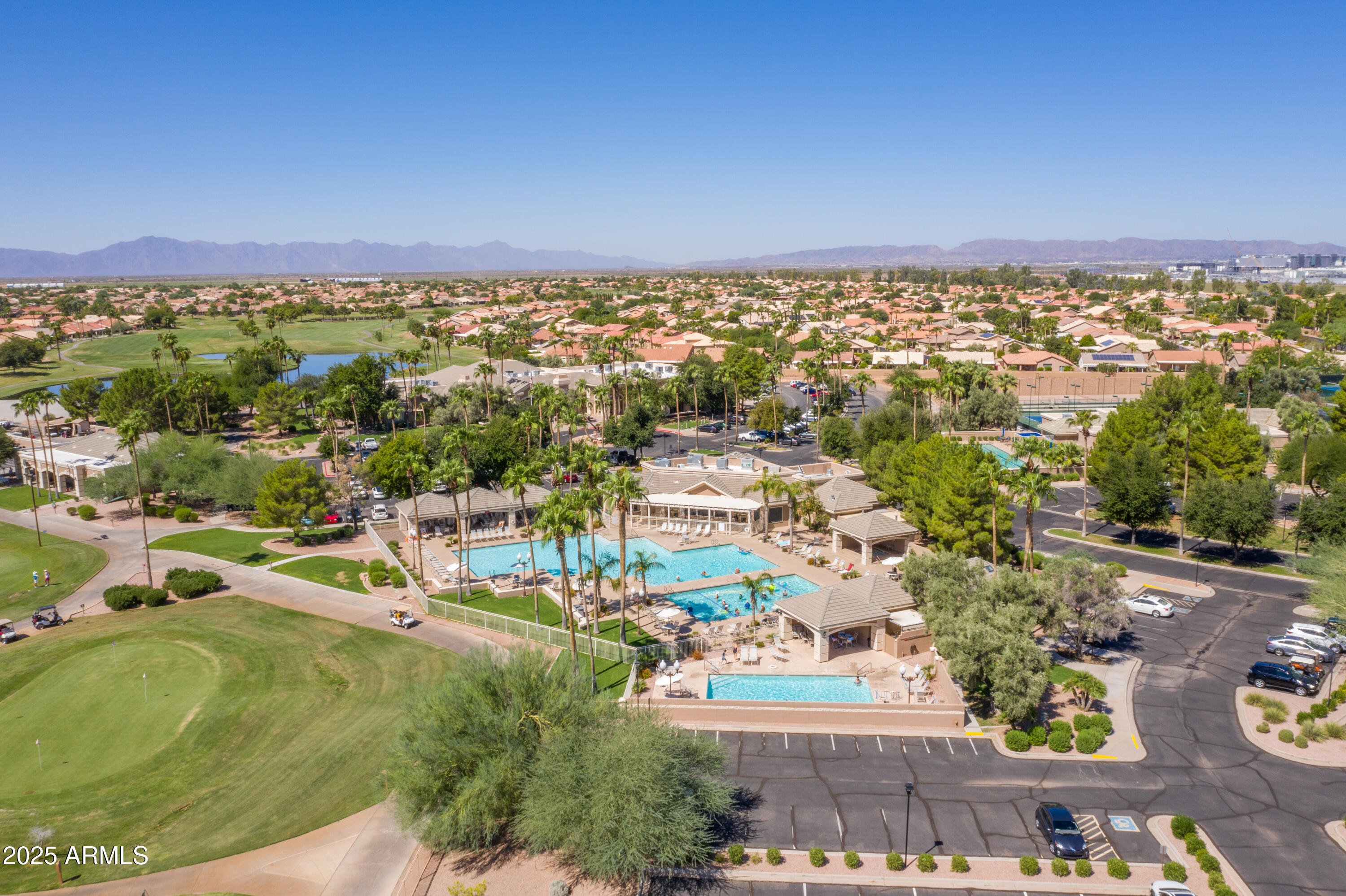 23745 South Vacation Way Sun Lakes, AZ 85248 - Photo 36 of 52 an aerial view of residential houses with outdoor space and trees