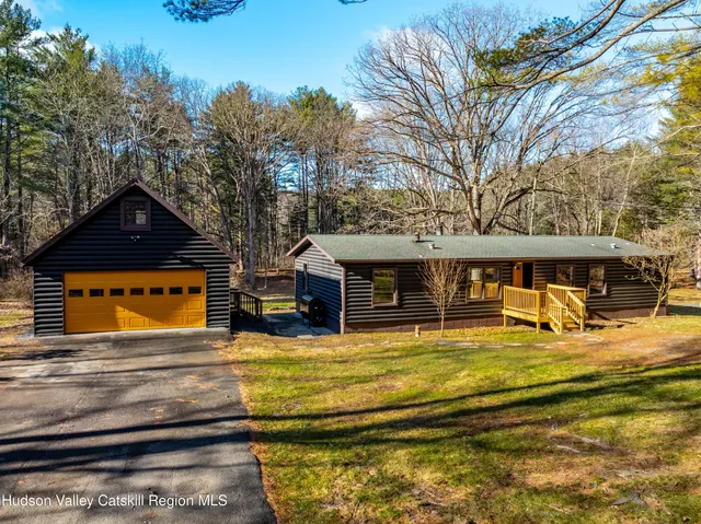 a view of a house with a swimming pool