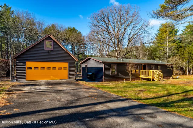 a view of a house with a big yard