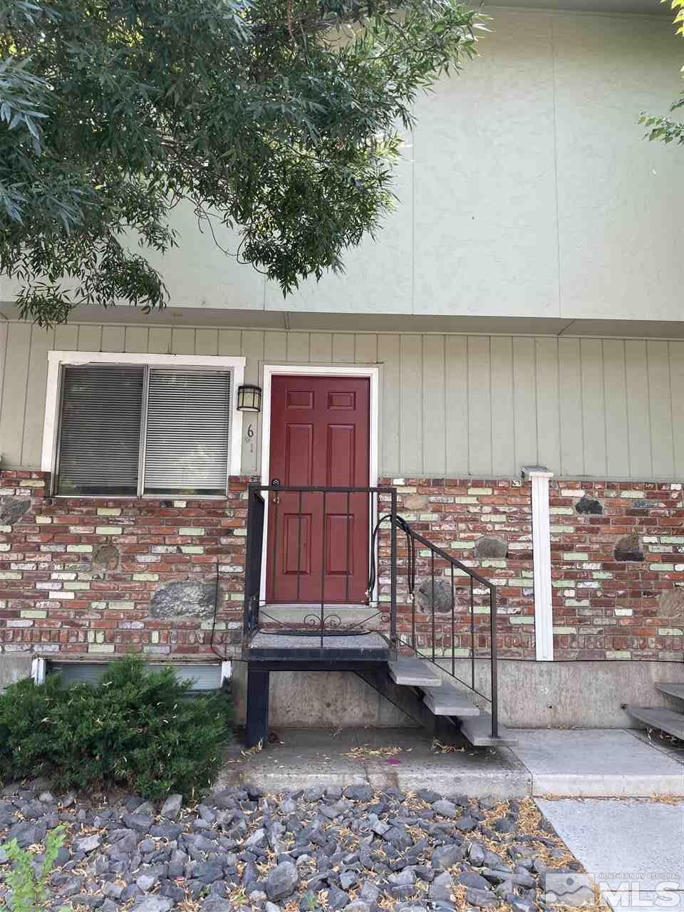 1402 East 9th Street, Unit 6 Reno, NV 89512 - Photo 1 of 10 a front view of a house with a yard