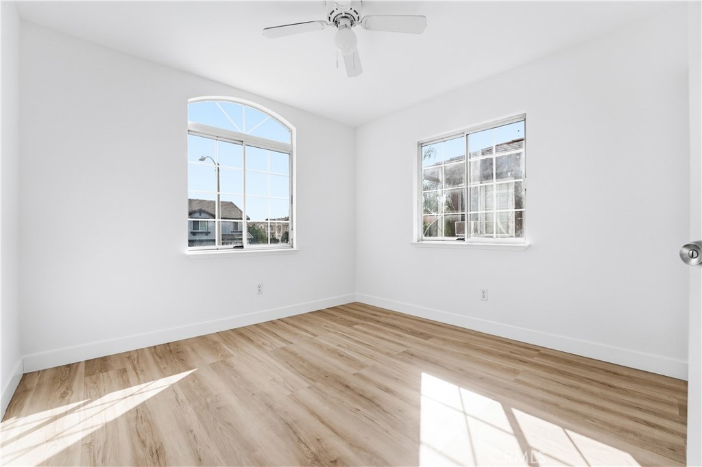 338 Mildred Street Perris, CA 92571 - Photo 21 of 34 a view of empty room with windows