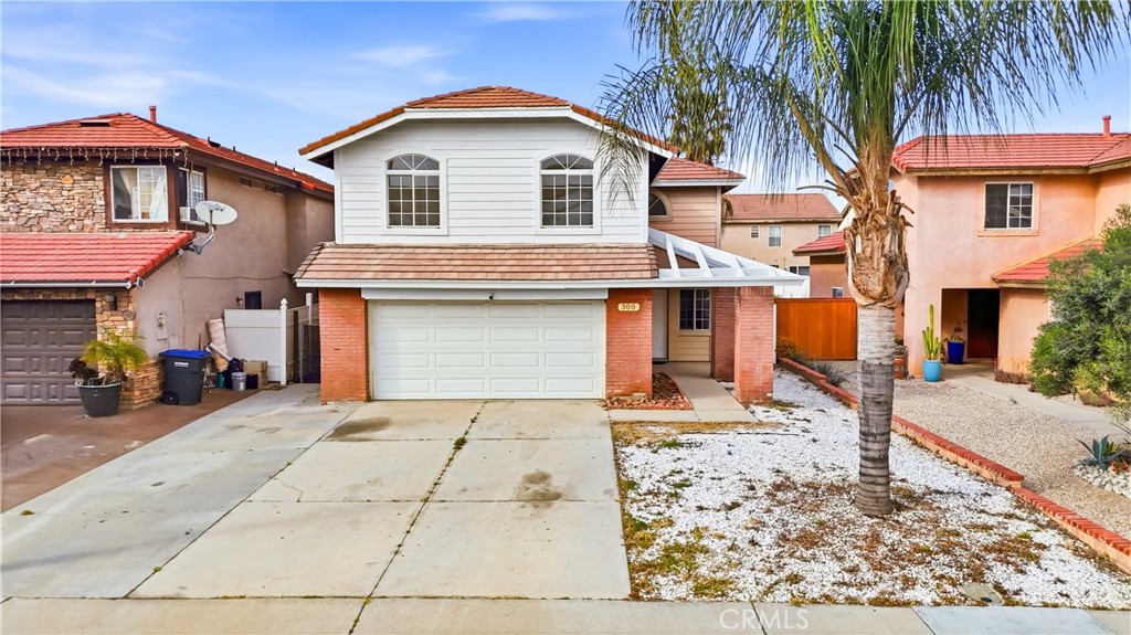 338 Mildred Street Perris, CA 92571 - Photo 25 of 34 a front view of a house