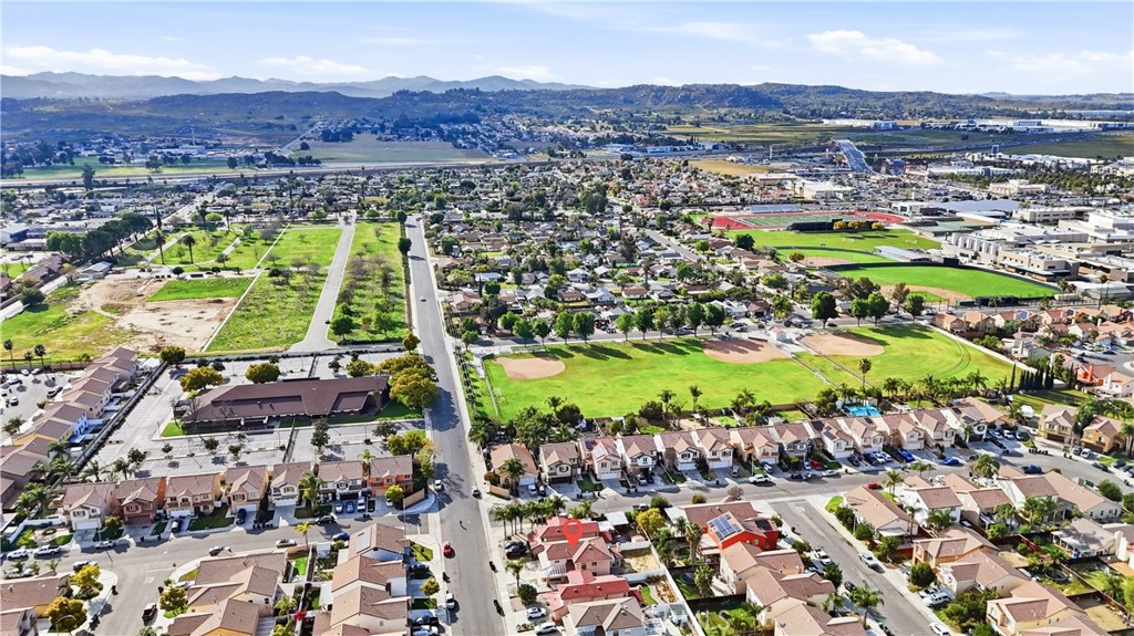 338 Mildred Street Perris, CA 92571 - Photo 32 of 34 an aerial view of residential building and lake