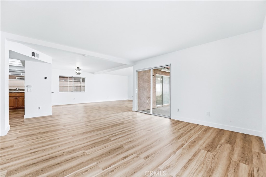 338 Mildred Street Perris, CA 92571 - Photo 5 of 34 wooden floor in an empty room