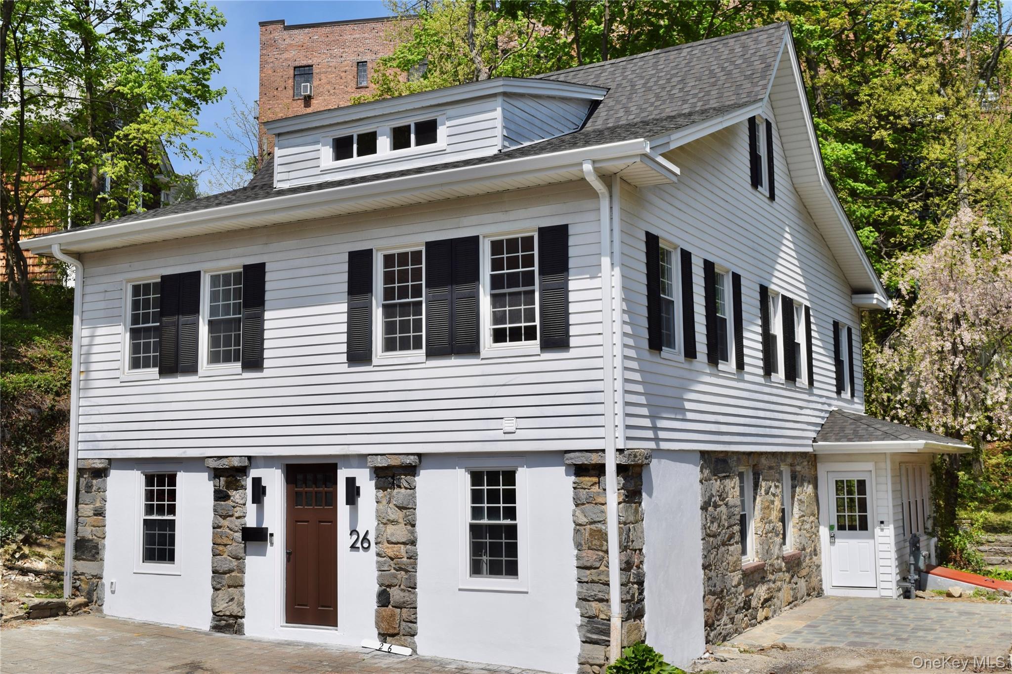 a front view of a house with balcony