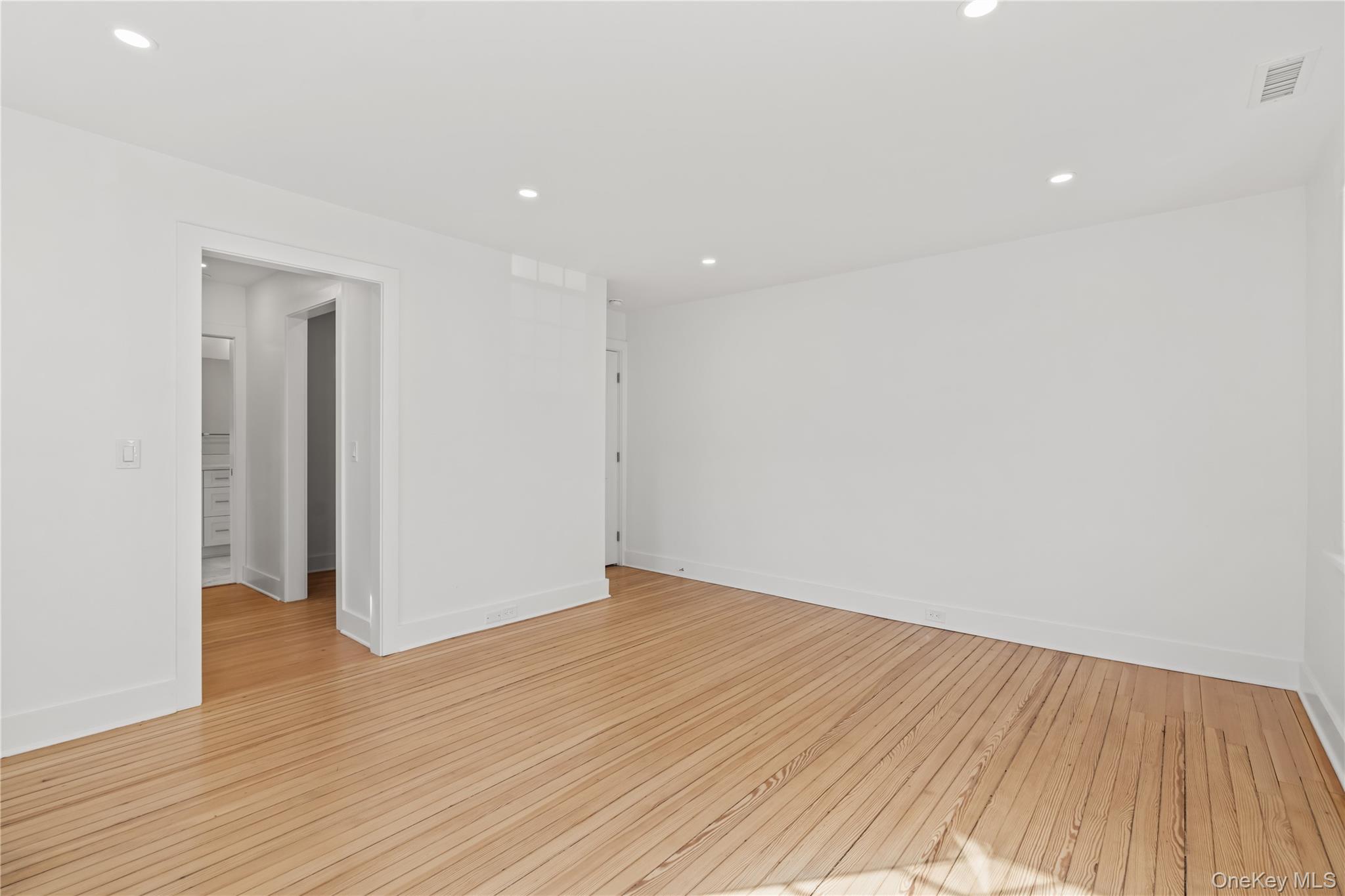26 Latimer Lane Bronxville, NY 10708 - Photo 18 of 37 a view of a room with wooden floor