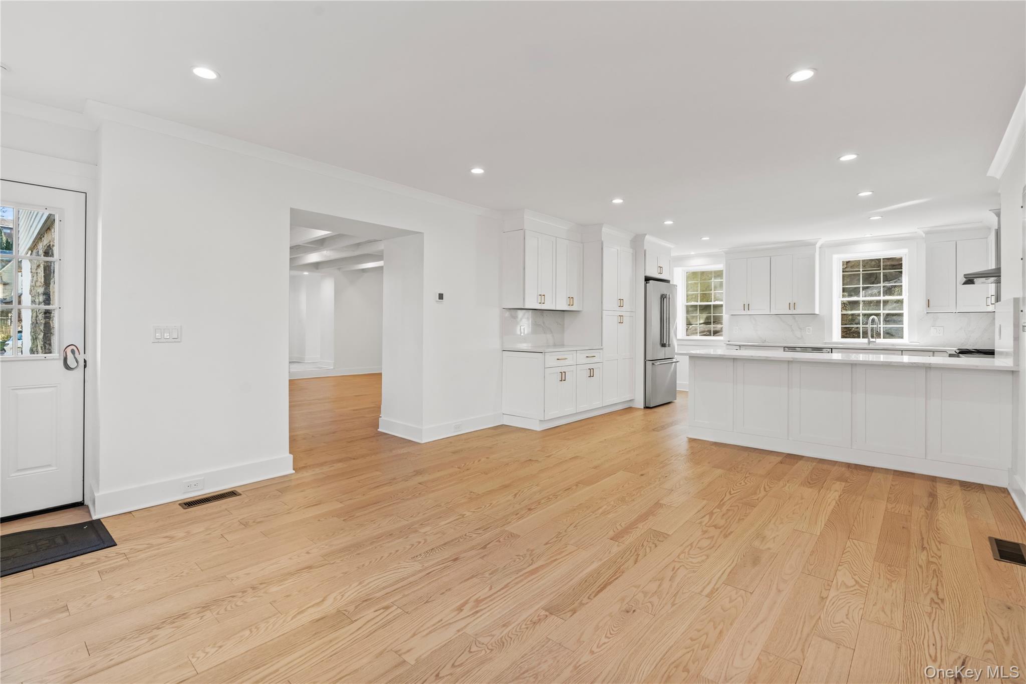 26 Latimer Lane Bronxville, NY 10708 - Photo 9 of 37 a view of a kitchen with large windows