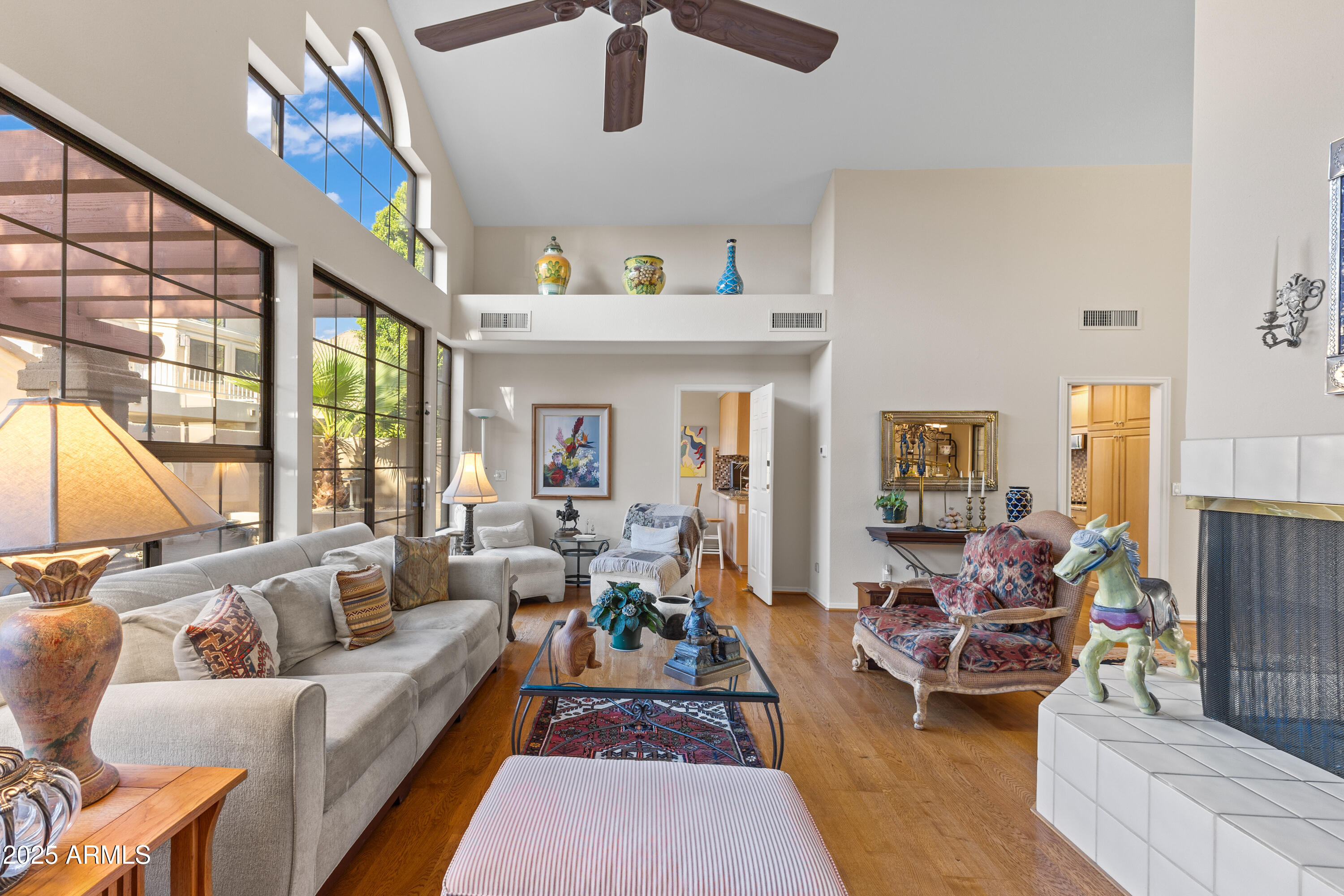 7525 East Gainey Ranch Road, Unit 164 Scottsdale, AZ 85258 - Photo 13 of 51 a living room with furniture or couch and a large window