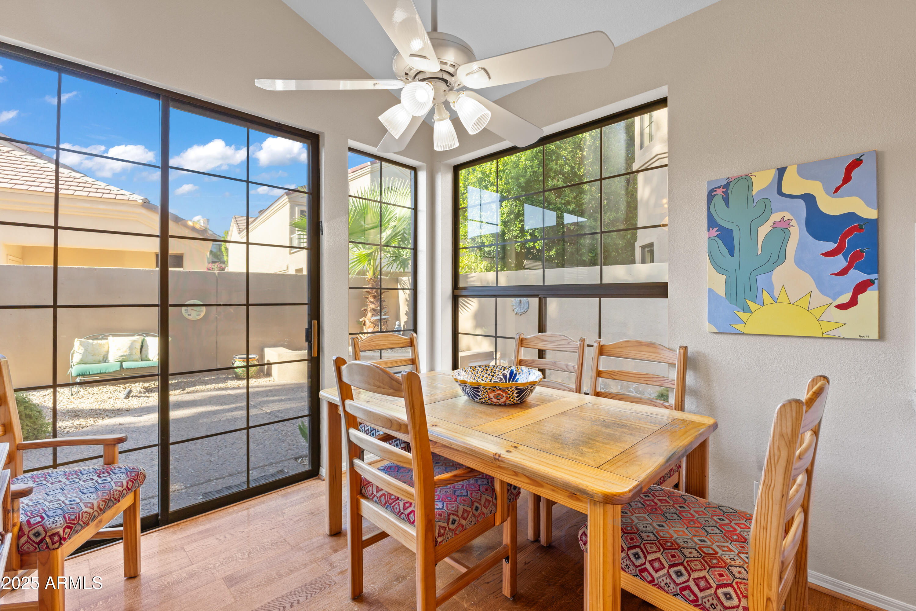 7525 East Gainey Ranch Road, Unit 164 Scottsdale, AZ 85258 - Photo 14 of 51 a view of a dining room with furniture large window and outside view