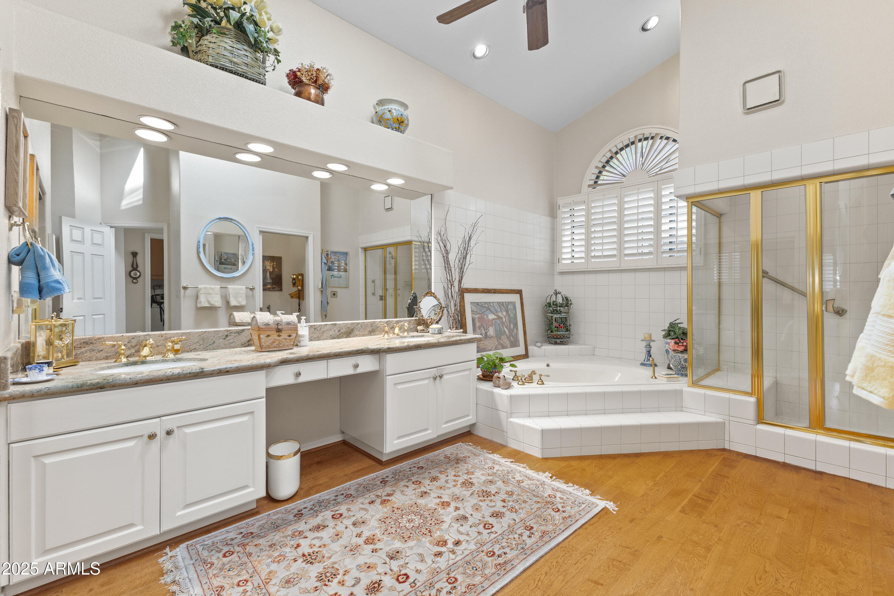 7525 East Gainey Ranch Road, Unit 164 Scottsdale, AZ 85258 - Photo 24 of 51 a large bathroom with a large tub sink and window