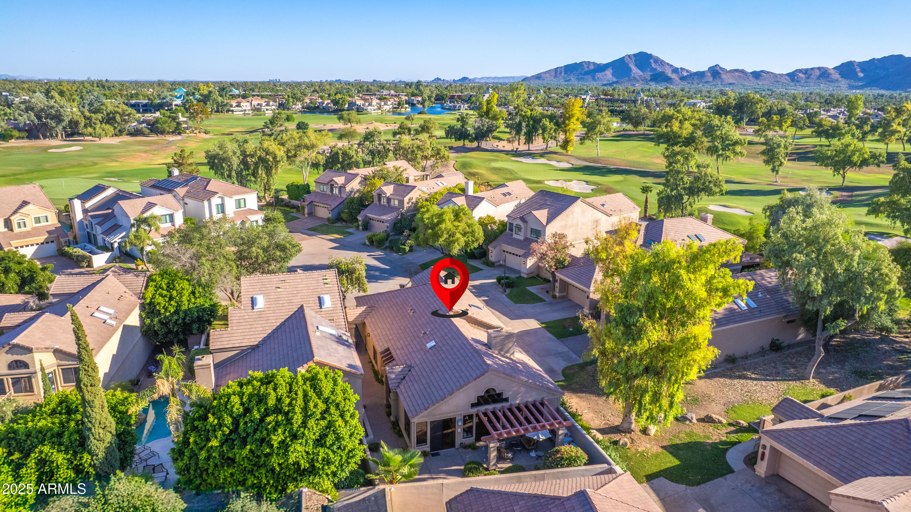 7525 East Gainey Ranch Road, Unit 164 Scottsdale, AZ 85258 - Photo 35 of 51 an aerial view of residential houses with outdoor space and swimming pool