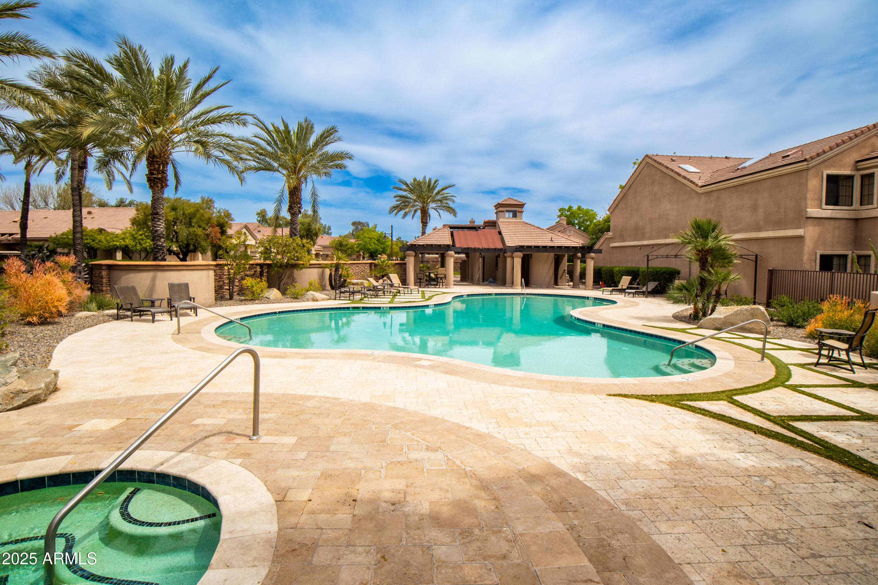 7525 East Gainey Ranch Road, Unit 164 Scottsdale, AZ 85258 - Photo 39 of 51 swimming pool with outdoor seating
