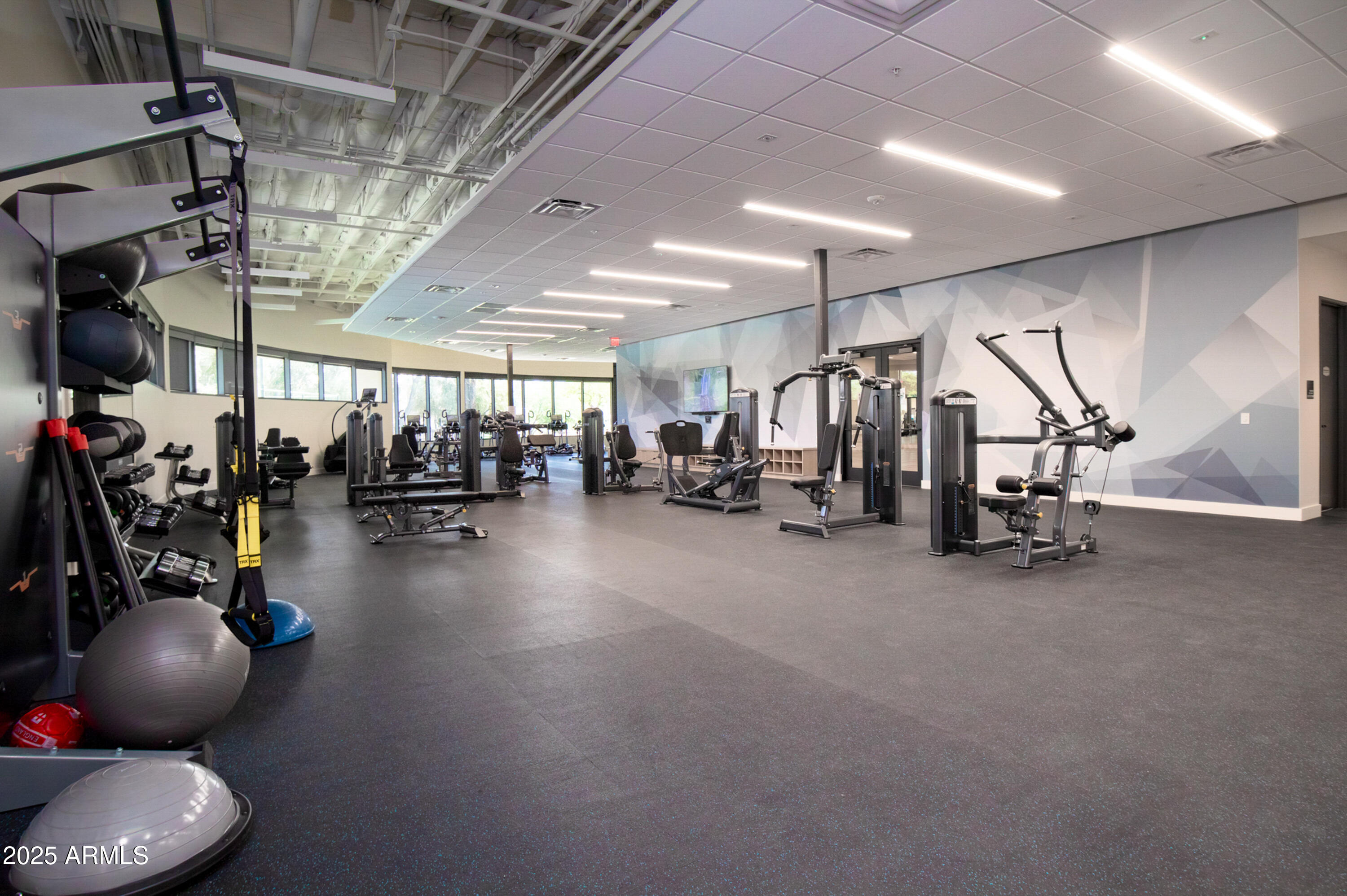 7525 East Gainey Ranch Road, Unit 164 Scottsdale, AZ 85258 - Photo 43 of 51 a view of a room with gym equipment
