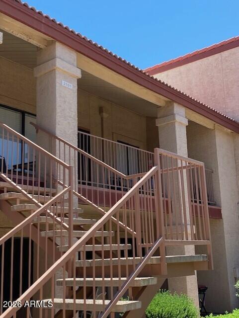 1440 North Idaho Road, Unit 2101 Apache Junction, AZ 85119 - Photo 20 of 23 1440 N Idaho #2101 Stairs to Front Door