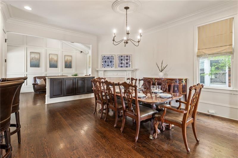 629 Boulevard Northeast Atlanta, GA 30308 - Photo 19 of 74 a view of a dining room with furniture window and wooden floor