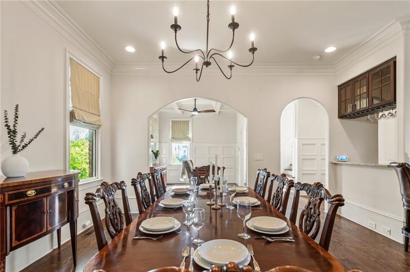 629 Boulevard Northeast Atlanta, GA 30308 - Photo 21 of 74 a view of a dining room with furniture window and wooden floor