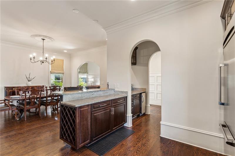 629 Boulevard Northeast Atlanta, GA 30308 - Photo 25 of 74 a kitchen with a stove and wooden floor