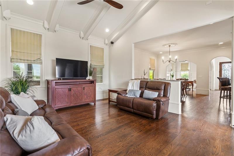 629 Boulevard Northeast Atlanta, GA 30308 - Photo 27 of 74 a living room with furniture a fireplace and a flat screen tv
