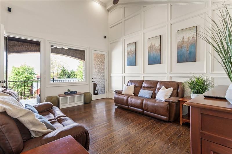 629 Boulevard Northeast Atlanta, GA 30308 - Photo 28 of 74 a living room with furniture and a large window