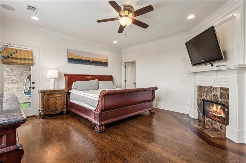 629 Boulevard Northeast Atlanta, GA 30308 - Photo 32 of 74 a bedroom with a bed and a flat screen tv