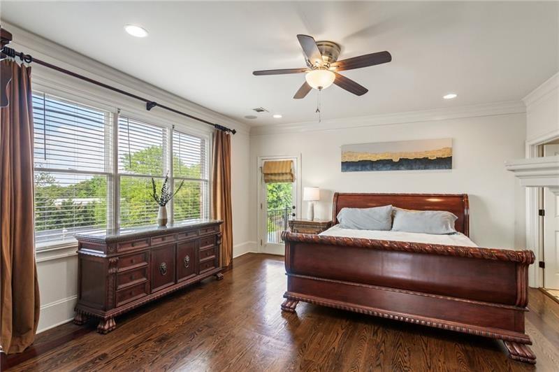 629 Boulevard Northeast Atlanta, GA 30308 - Photo 33 of 74 a bedroom with a bed and a large window