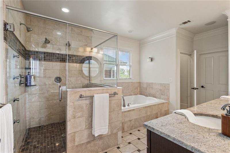 629 Boulevard Northeast Atlanta, GA 30308 - Photo 38 of 74 a bathroom with a granite countertop bathtub shower sink and mirror