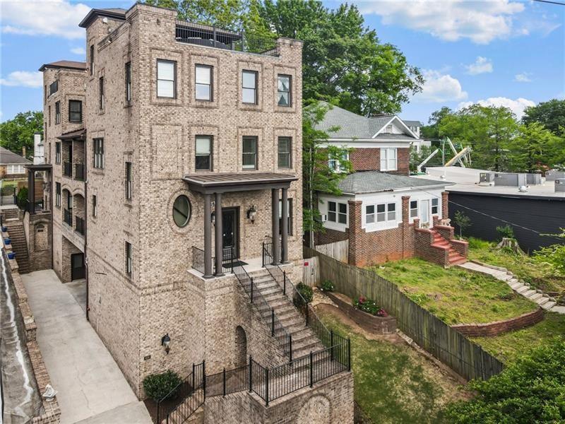 629 Boulevard Northeast Atlanta, GA 30308 - Photo 4 of 74 front view of a building with a yard