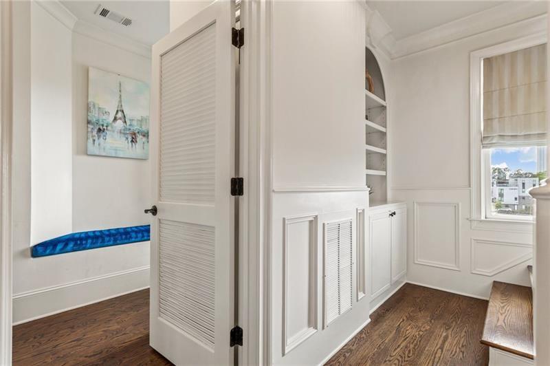 629 Boulevard Northeast Atlanta, GA 30308 - Photo 47 of 74 a view of a hallway with wooden floor and staircase