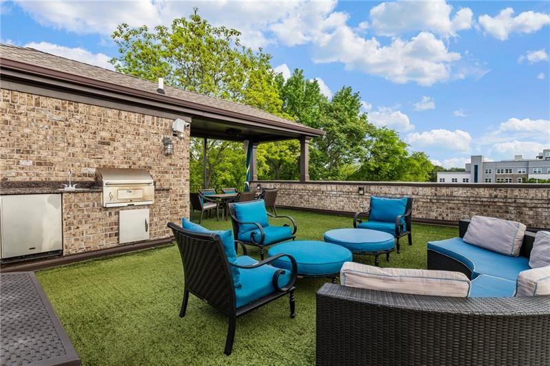 629 Boulevard Northeast Atlanta, GA 30308 - Photo 63 of 74 a view of a patio with couches chairs and a table