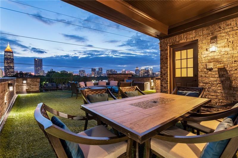 629 Boulevard Northeast Atlanta, GA 30308 - Photo 65 of 74 a view of a balcony with table and chairs